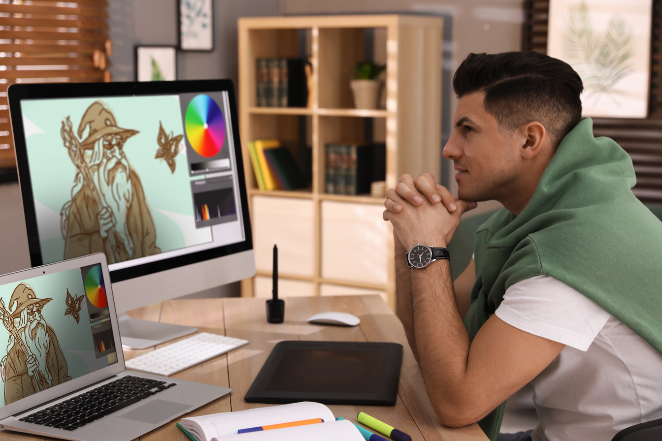 Professional Retoucher Working on Computer in Office